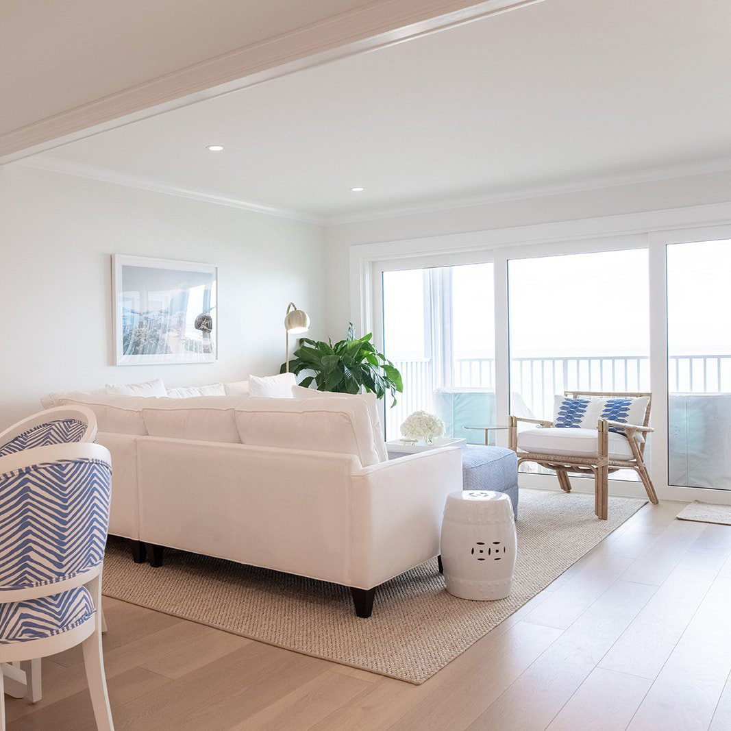sofa in living room facing sliding glass doors
