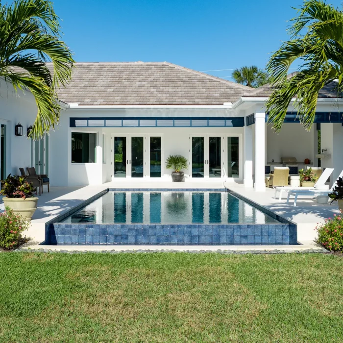 rear of the house with pool